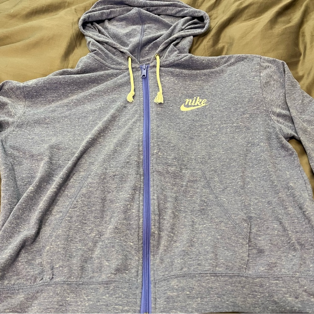 Women’s light blue Nike zip up hoodie. Size large.